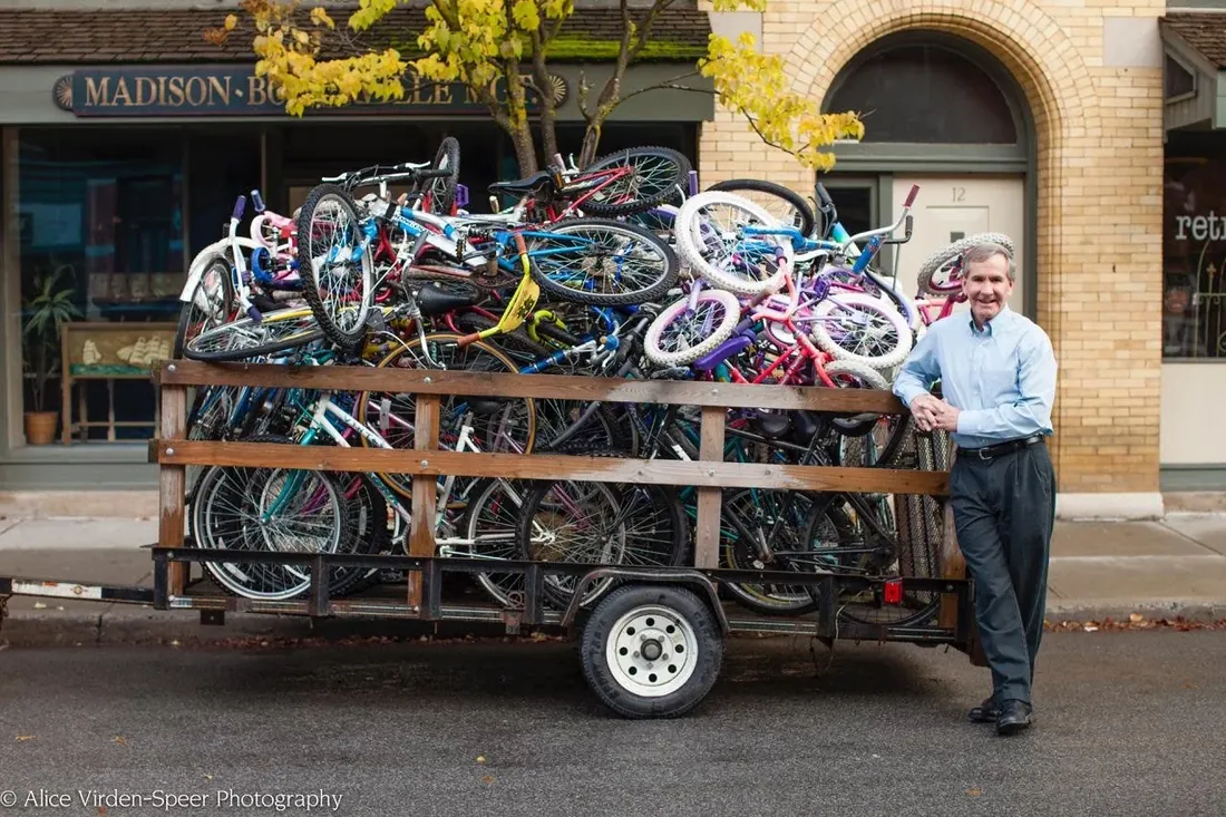 A trailer piled high with donated bikes on a Hamilton street
