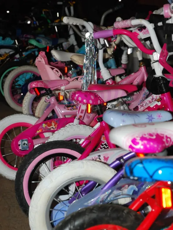 Kids bikes lined up in the workshop