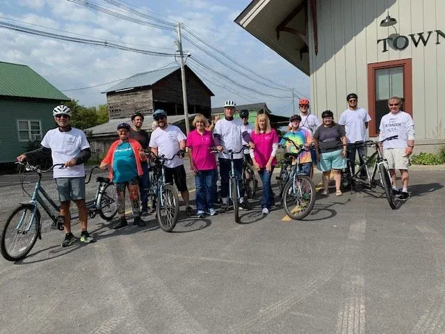 A group of tandem riders and volunteers in Hamilton